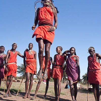 Serengheti, Kenya, May 23, 2006. Masai warriors in traditional costume during a ritual.